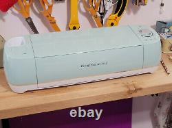 Cricut Explore Air 2 Cutting Machine Mint with pens and weeding tools