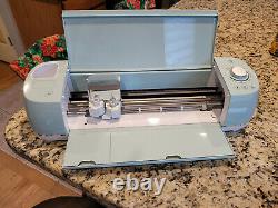 Cricut Explore Air 2 Cutting Machine Mint with pens and weeding tools